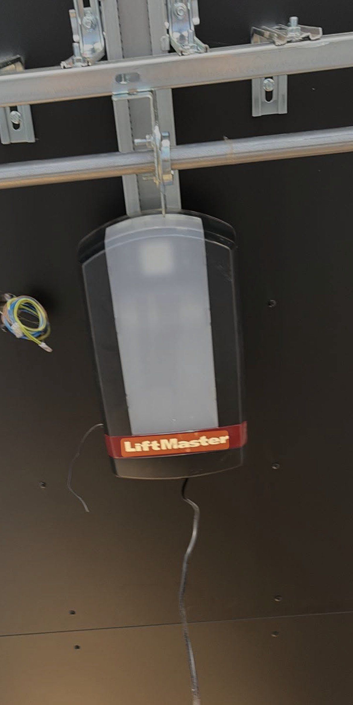 The door opener on the carport ceiling.